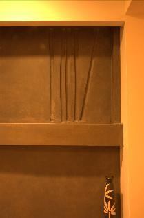Bamboo details add a surprise element, which appear at the bottom of the stairs, on the hand rail, and cast into the water wall.
