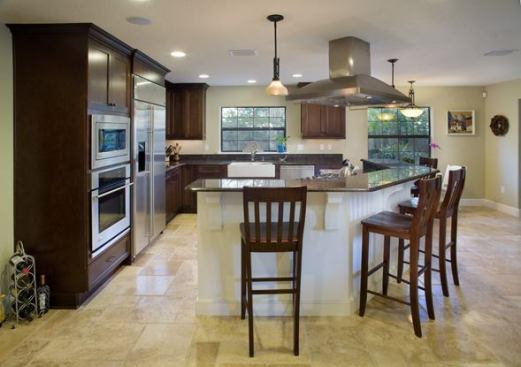 Phil Kean Designs installed all Energy Star-labeled appliances in the kitchen. Over 95% of the home is lit with compact fluorescent light bulbs, which last longer than regular incandescent bulbs and produce less heat inside the home -- an important consideration in Florida. The home also has a high efficiency air conditioning unit, a solar water heater, and insulated glass windows.