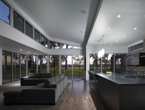 The great room enjoys a broad view of the Missouri River. A south-facing clerestory directs daylight deep into the kitchen area.