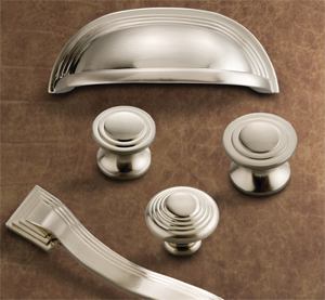 Marked by sweeping curves, the Deco collection of decorative cabinet hardware recalls the industrial designs of the Roaring Twenties but should fit nicely in a modern or a traditional home. Available in a satin nickel fi nish, the products include cabinet knobs and a cup pull. Hickory Hardware. 877-556-2918. www.hickoryhardware.com.