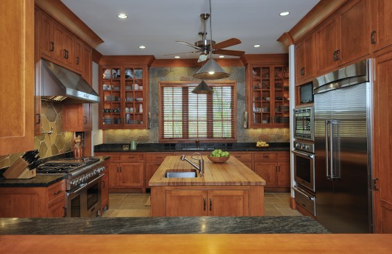 In the spacious, cook's kitchen is a mix of materials: granite countertops, Douglas Fir cabinetry, and white oak and slate floors.The island is big enough for two to cook dinner together, and it's great for baking.