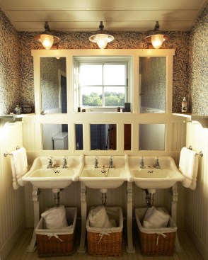 Salvage sinks are put to clever use in the second bathroom, enabling three-at-a-time toothbrushing.  