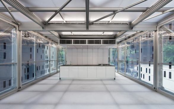 Factory-made elements such as floors, ceilings, stairs, bathrooms, and mechanical components attach to Cellophane's aluminum frame, and when it's no longer needed, the house can be disassembled and its parts recycled or reused.