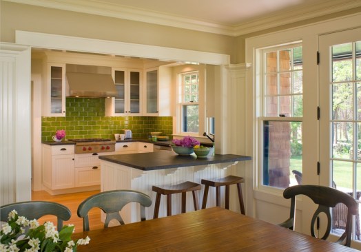 The dining room flows into the kitchen, making for an open plan space that’s clearly defined.