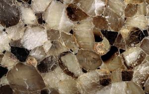 Antolini countertops are made from semi-precious stone, including agate, quartz, topaz, petrified wood, and amethyst. Slabs are 3 centimeters thick and can be backlit. Typical dimensions are 60 by 120 inches. Luck Stone. 800.898.5825. www.charlesluck.com.