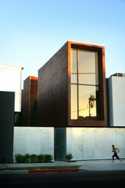 The project was built for a modest $82 per square foot, with no government subsidies. Cost saving materials include rusted mild steel cladding (an economical alternative to Cor-Ten)...