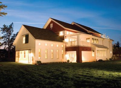 As crisp and picturesque as autumn in New England, the Stonebridge Club is a social hub for residents at The Pinehills, a master planned community. Red and white with rambling appendages, the main building is meant to evoke an old New England barn.