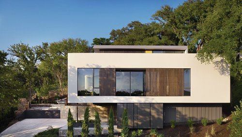 Parkside residences make use of an overlooked lot on a commercial strip in Austin, Texas. 