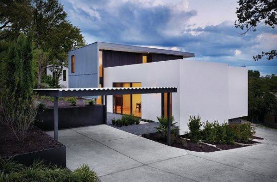The spec houses overcame other obstacles in addition to the unlikely site. The site was on an unstable, 60-foot slope, and the client wanted the project team to help her buy, subdivide, and build on the lot. 