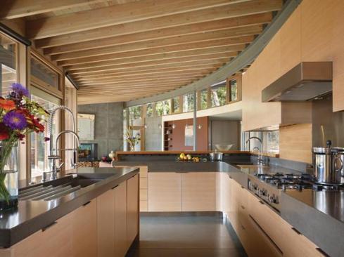 Douglas fir doors, windows, and millwork give the interior an all-of-a-piece quality.