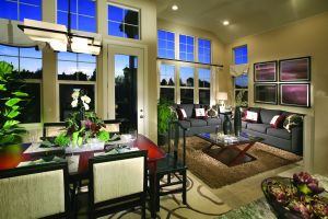 Inside, however, it's actually three floors tall, with a large master suite tucked under the roof structure. The second level kitchen, family and dining zones feel equally roomy, thanks to oversized picture windows. Builder/Developer: SummerHill Homes Architect: Dahlin Group