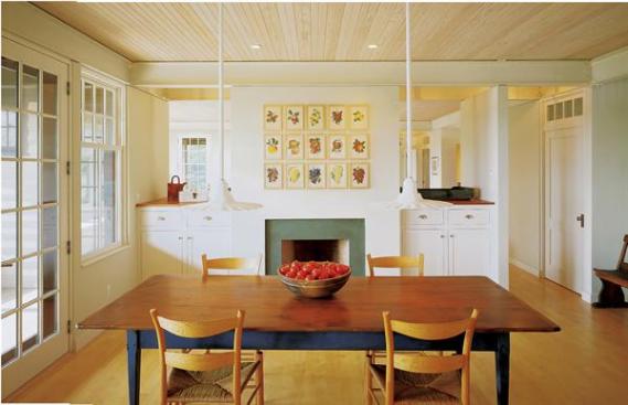 A straightforward plan and exposed structural elements - central Modernist themes - harmonize here with some classic cottage touches.