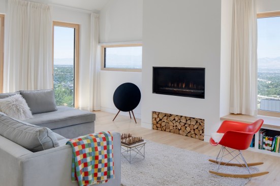 Besides the modern gas fireplace and a two-burner stove, the home is all-electric.