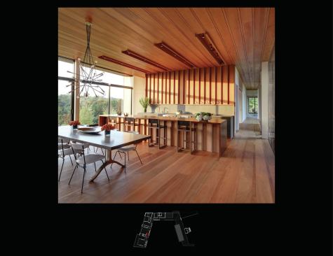 The mahogany decking consists of 1 ½-inch-square timbers flanking 9 ½-inch boards, a pattern the architects abstracted throughout the house. In the kitchen, for example, the ceiling boards drop out to create a trough for light fixtures. “You’re not just punching holes all over the place to put in these things that need a home, but integrating them into the system,” Masi says.
