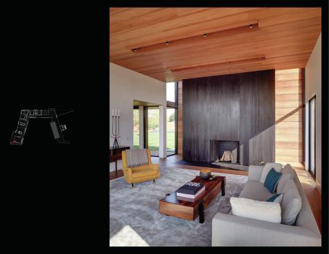 At the entryway, a dramatic glass slot brings in light from above.