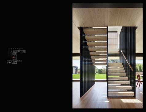 The treads of the wood-and-steel stair are cut from the same material as the floor structure.