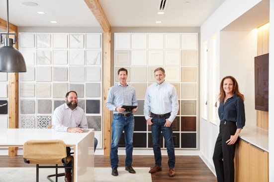 Pictured, from left, are senior vice president of purchasing Adam Weaver, senior vice president of land acquisition Thad DiGiuro, senior vice president of construction Ken Newman, and chief legal officer Deborah Danzig.
