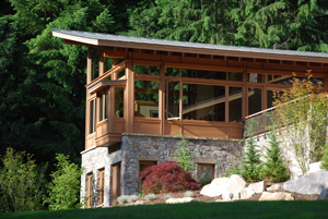  and a deceptively complex bedroom wing roof whose diagonally oriented ridge rises to a high point over the master bedroom.