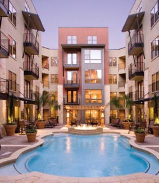 The infill site backed up to two other properties, meaning views were restricted in two directions. The solution: All units are oriented toward two internal courtyards and/or the building's two frontal streets, with open floor plans and ample glazing to flood interiors with natural light.