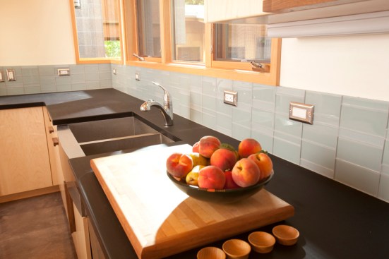Overall shot of kitchen and how it relates to the space