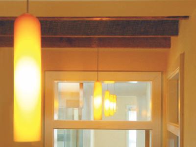 Working within tight limitations can yield spirited design, as this well-executed architectural maneuver proves. The program was simple: Renovate a bath on the top floor of a small row house and make its attic stair and attic space usable.