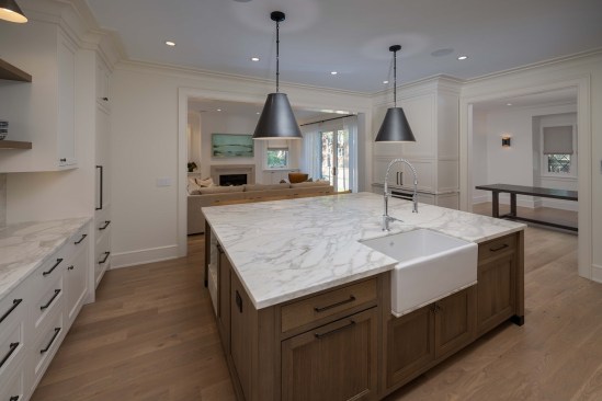 To create a more open floor plan, several of the home’s cased openings were expanded.
