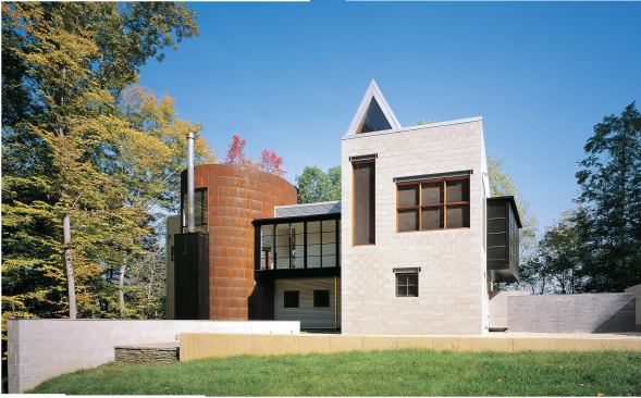 Careful placement of windows and courtyard walls is part of a scheme that is designed to eliminate views of neighboring houses as much as it is oriented to river and woodland views.