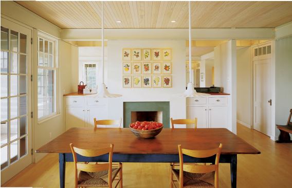 A straightforward plan and exposed structural elements—central Modernist themes—harmonize here with some classic cottage touches.