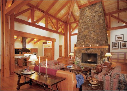 Massive timbers of recycled Douglas fir match the generous scale of the main building. Masonry walls of local sandstone and broad roof overhangs convey a sense of solidity and shelter.