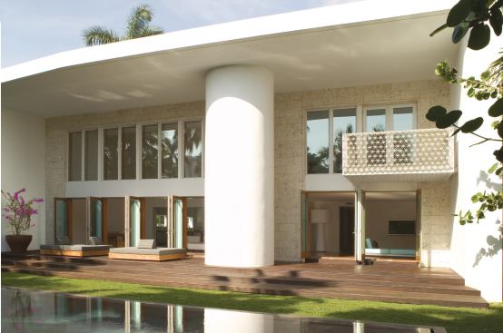 A second-story addition and fullscale renovation turned this former Miami Beach, Fla., ranch house into a dramatically scaled container for a contemporary, outdoorsoriented lifestyle.