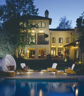 By enlarging the loggia and replacing the master bedroom balcony’s solid walls with metal railings, the architects improved the home’s relationship with the rear yard.