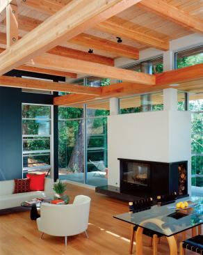 The grid of exposed ceiling beams adds a sense of warmth and another layer of texture to the home’s main living spaces.