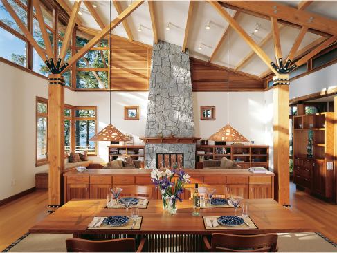 Light and fresh air stream in through the clerestories on the home’s west side. Massive granite fireplaces anchor the living room (this page) and master bedroom(opposite, bottom).