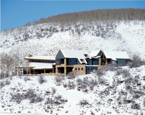 This country home employs regional materials in a contemporary composition.