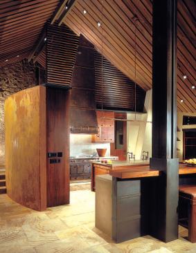 The bold geometry and unique combination of materials in this kitchen caught our judges’ eyes, but the same qualities integrate the room with its context: a bold and unique house.