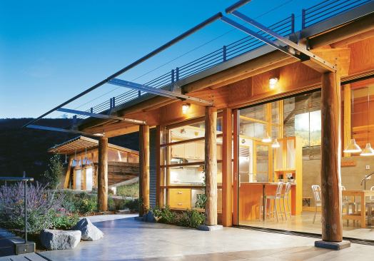 Metal and reclaimed wood siding, meanwhile, stand up to the elements year-round.