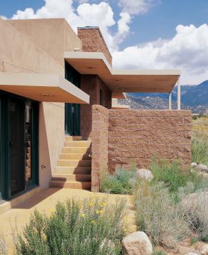 Housing a three-generation family at a bargain price, this New Mexico home gives up nothing in style to its trophy-house neighbors.