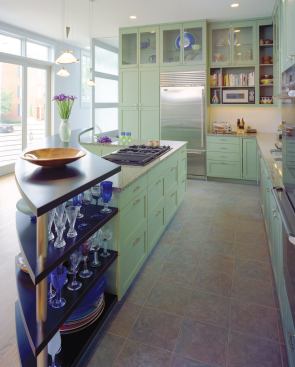 The kitchen is the stylish focal point of the living level.