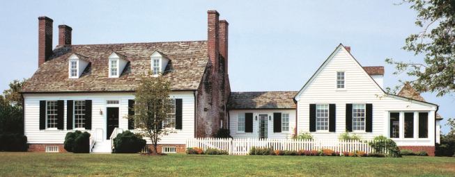 The addition doubled the size of a historic manor house while leaving its character intact.