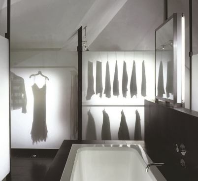 The judges were struck by the ghostly quality of the clothes’ shadows on the laminated glass. A white Venetian plaster finish on the walls and ceiling allows light to bounce around the room.