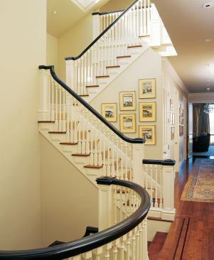 A custom stair detailer restored and reproduced the original railings.