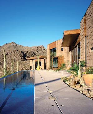 Exterior accents are rusted steel.