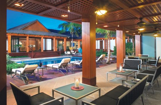 The carpenters cut each 2-by-2-inch piece of latticework on a CNC machine for accuracy. A sealer applied to all the exterior wood three times a year keeps salt and moisture at bay.