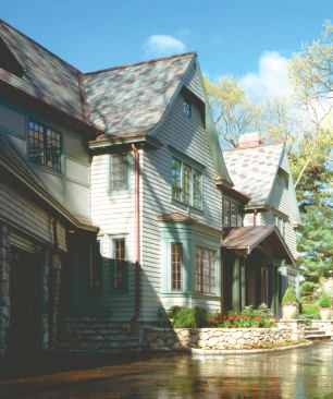 A muddled colonial—and borderline teardown candidate—provided the raw material for this extensive Shingle style remodel. Despite the thoroughness of the transformation, however, a surprising amount of original structure remains.