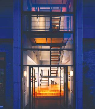 And they skillfully punctured the house with industrial-style windows and doors to promote an indoor/outdoor relationship.