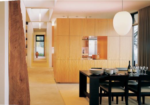 Custom blocks of cabinetry define the public spaces.