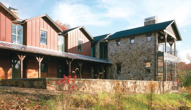 The exterior materials of this weekend retreat wrap to the interior, reinforcing its theme of refined rusticity.