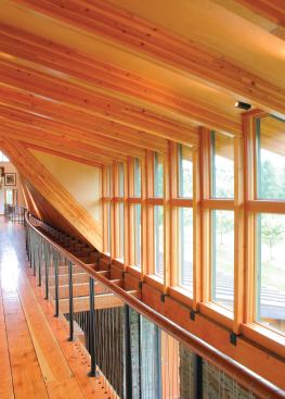 Architect Thomas Meyer designed this visually and technically complex house, but he credits Choice Wood with figuring out how to actually build it. One challenge: an asymmetrical roof with a ridge that curves in plan and slopes from one end to the other, yielding no two rafters alike.