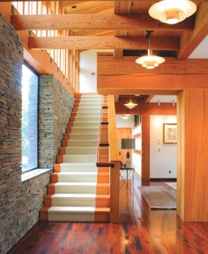 Exposed timber framing, some of it massively oversized, offers a cutaway view of the house's structure—and would expose any false move by the framing crew. "Those guys had to become millwrights in a way," says Meyer, "working with timbers that big. And outdoors, in this climate."