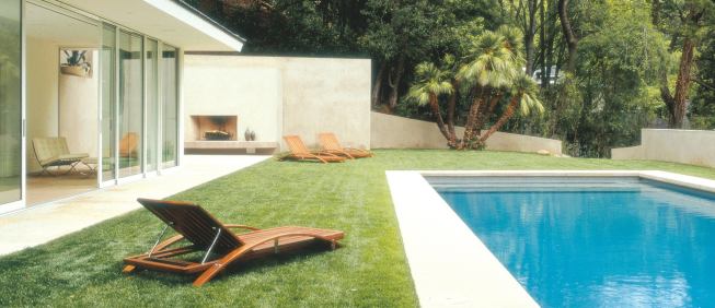 Custom Home Outdoors – Winter 2005 “Open House” from Pool Houses case study Architect: Montalba Architects, Santa Monica, Calif.; Builder: Sarlan Builders, Santa Monica This 680-square-foot pavilion features disappearing glass walls on three sides. A 42-foot cambered steel beam gives the gabled roof enough support so that concrete roof tiles don't put pressure on the sliding glass. Architect David Montalba strengthened the bond between pavilion and pool by making them the same size and shape.